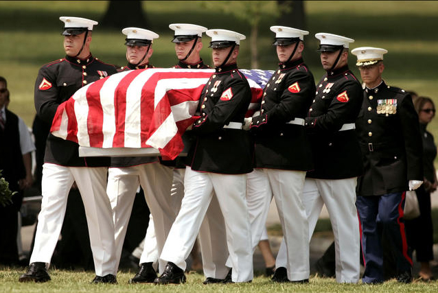 A Marine Corps honor guard carries the casket of Marine Sgt. David Russell Christoff, of Springfield, Ohio, during funeral services at Arlington National Cemetery in Arlington, Va.. Wednesday, May 31, 2006. (AP Photo/Haraz N. Ghanbari)